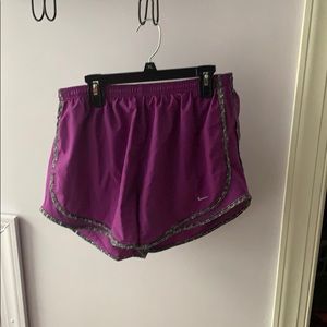 Purple Nike running shorts